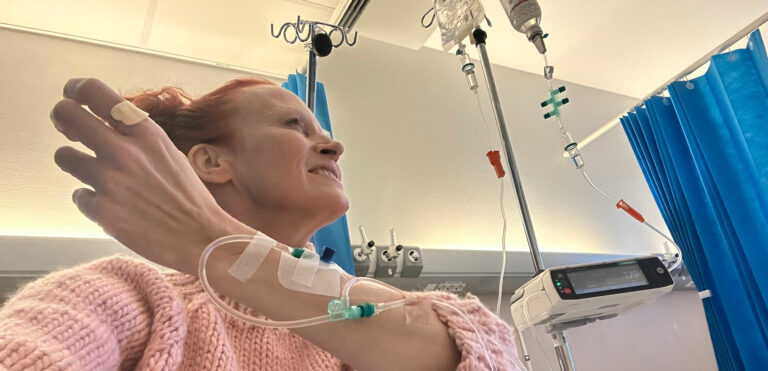 Woman receiving plasma medication in the hospital.