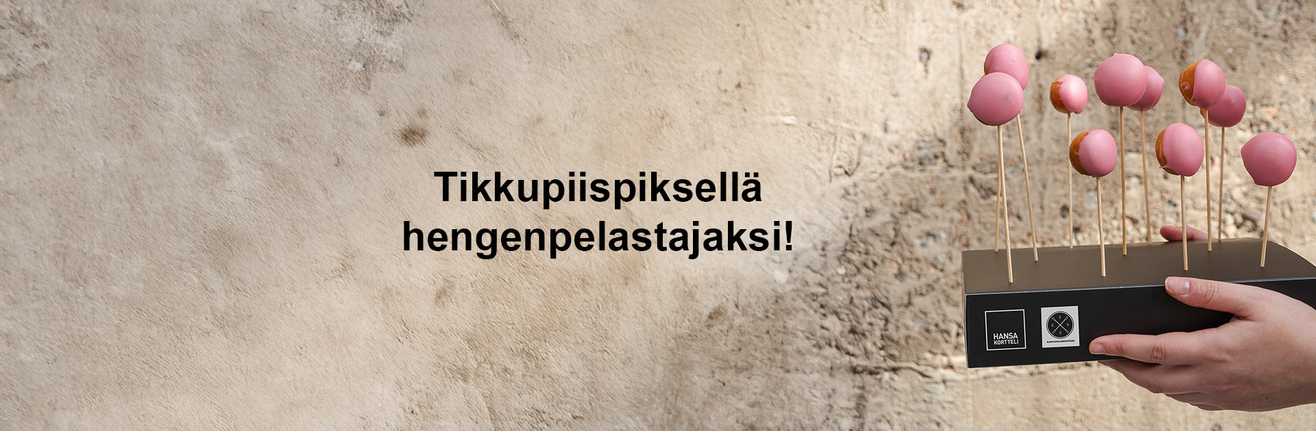 Pieniä piispanmunkkeja tikun päässä ja teksit: Tikkupiispiksellä hengenpelastajaksi.
