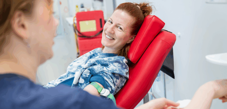 woman donating blood at blood donation center